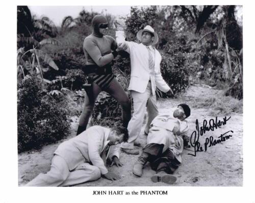 THE PHANTOM: A black and white picture featuring John Hart as the Phantom, autographed by John Hart