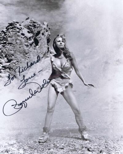 RAQUEL WELCH: A black and white picture of Raquel Welch in 'One Million Years B.C.' personally inscribed and signed by Raquel Welch