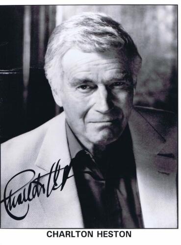 CHARLTON HESTON: A autographed black and white portrait of Charlton Heston