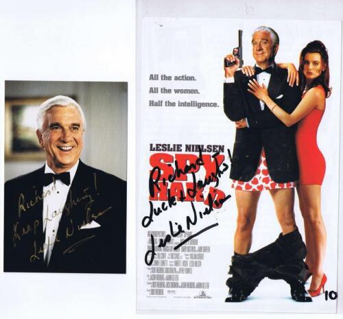 SPY HARD: Two items relating to the film 'Spy Hard', one being a autographed double sided flyer from the movie, the other a colour autographed portrait of Leslie Nielsen. Both items autographs personalised.