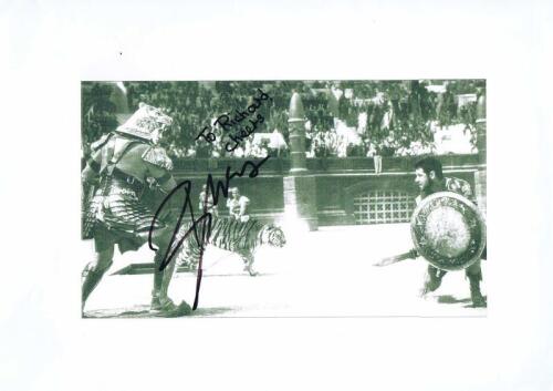 GLADIATOR: A black and white picture scene of Russell Crowe as Maximus from film 'Gladiator', personally inscribed and signed by Russell Crowe