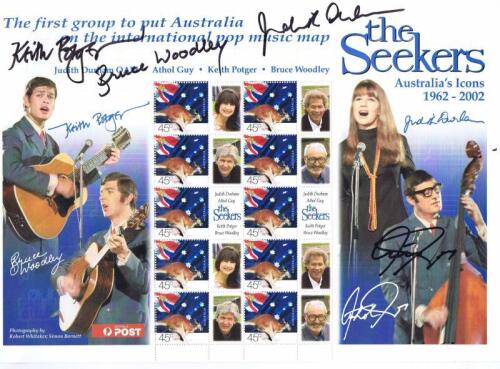 SEEKERS: A 2002 Australia Post stamp sheet featuring 'the Seekers, Australia's Icons 1962 - 2002'. Stamp sheet signed by all band members - Keith Potger, Bruce Woodley, Judith Durham, Athol Guy