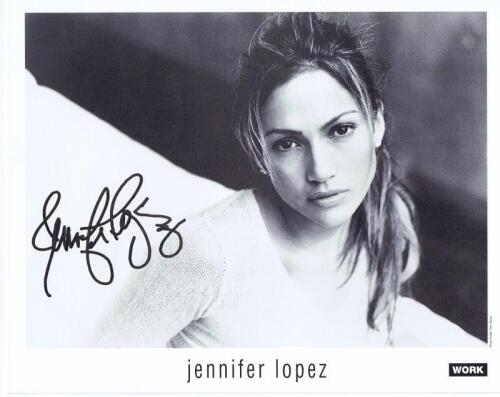 LOPEZ: A black and white publicity picture card of Jennifer Lopez by WORK. Jennifer Lopez signature
