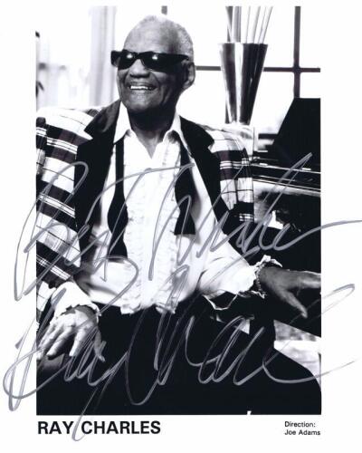 RAY CHARLES: A black and white publicity picture of Ray Charles. Ray Charles signature