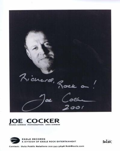 COCKER: A black and white EAGLE RECORDS publicity picture of JOE COCKER. Card signed by Joe Cocker