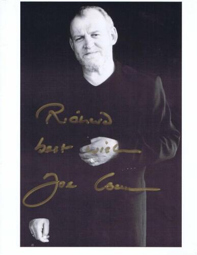 COCKER: A black and white picture of JOE COCKER. Joe Cocker signature