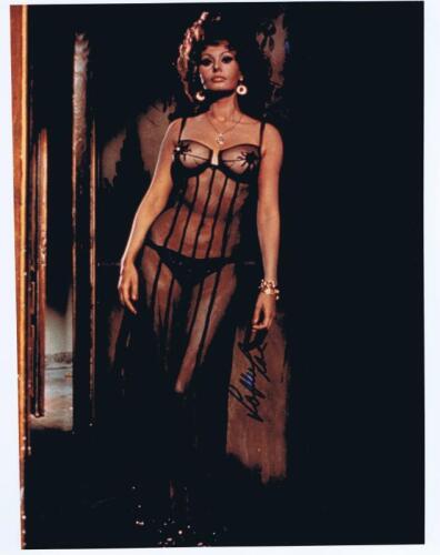 SOPHIA LOREN: A colour picture of Sophia Loren autographed in blue marker by Sophia Loren.