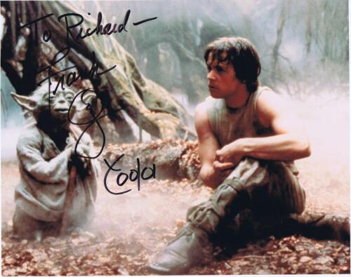 STAR WARS: A colour picture featuring both Luke Skywalker and Yoda, personally signed and inscribed by Frank Oz