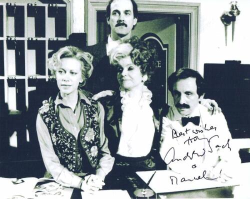 FAWLTY TOWERS: A black and white picture from Fawlty Towers, autographed by Andrew Sachs in black marker, 25.5cm wide, 20cm high