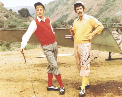 M*A*S*H: A colour picture featuring Donald Sutherland and Elliot Gould, autographed by Elliot Gould