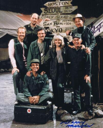 M*A*S*H: A colour picture featuring the Mash cast, autographed by Harry Morgan and William Christopher
