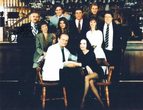 SITCOM CHEERS: A colour picture of cast from american sitcom 'Cheers' autographed by John Ratzenberger