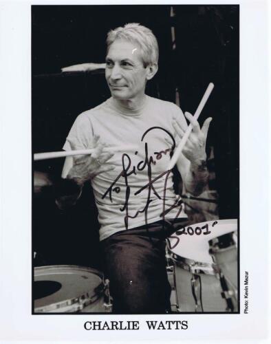 ROLLING STONES: A black and white picture featuring Rolling Stones drummer Charlie Watts, with personalised signature