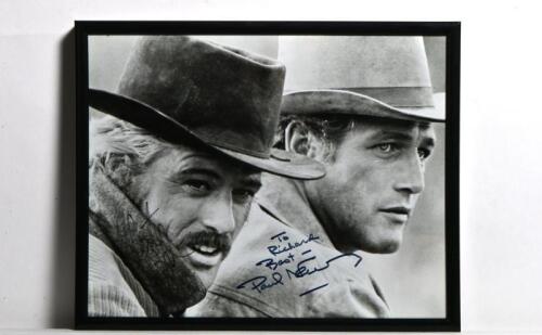 BUTCH CASSIDY: A black and white picture from Butch Cassidy and the Sundance&nbsp;Kid, personally inscribed and signed by Paul Newman and Robert Redford. Framed and glazed&nbsp;