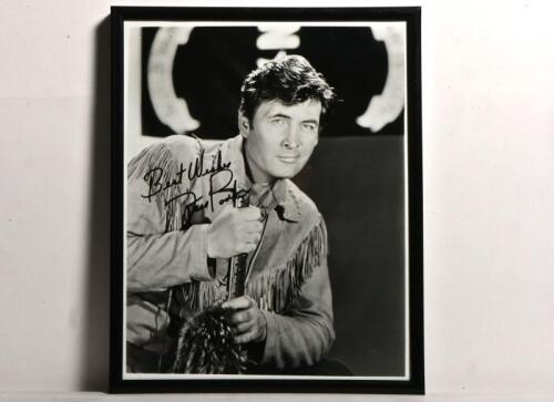 FESS PARKER: A autographed black and white portrait of Fess Parker, framed and glazed