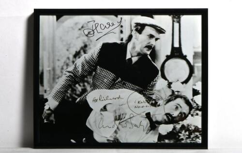 FAWLTY TOWERS: A black and white picture from Fawlty Towers, autographed by John Cleese and personally inscribed and signed by Andrew Sachs