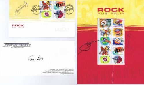 Australian Music: Four items related to Australian Music including a Rock Australia, stamp set autographed by John Farnham and possibly&nbsp;Mandawuy Yunupingu from Yothu&nbsp;Yindi, a First day of issue Rock australia envelope with 4 attatched stamps, and two Yoth