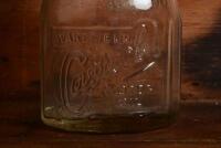 CASTROL: A 1940/50s "Castrol" embossed one imperial pint oil bottle, with 1950/60s "Castrol AA SAE 40" tin pourer and dust cover (updated description) - 2