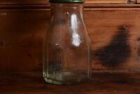 CASTROL: A 1940/50s "Castrol" embossed one imperial pint oil bottle, with late 20th century "Castrol XXL 40-50 MS" tin pourer and dust cover - 6