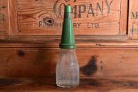 CASTROL: A 1940/50s "Castrol" embossed one imperial pint oil bottle, with late 1950/60s "Castrol AA SAE 40" tin pourer and dust cover - 4