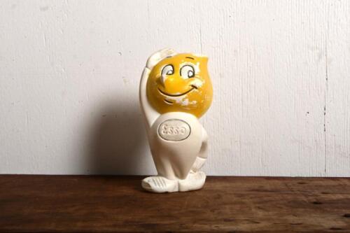 ESSO: A rare circa 1950s/1960s Esso 'Mr. Drip' plastic money box, small indentation to one foot, these are rare as they had to be broken to remove the coins, 14cm high