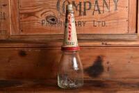 ATLANTIC: An early "Atlantic Union Oil Company" embossed one pint oil bottle, with original "Atlantic Heavy SAE 40" tin pourer and dust cover, with rivet air hole