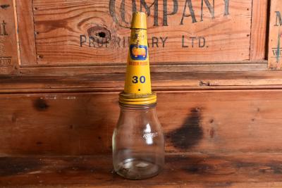 GOLDEN FLEECE: A one imperial pint oil bottle, with "Golden Fleece 30" tin pourer and dust cover