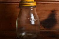 GOLDEN FLEECE: A one imperial pint oil bottle, with "Golden Fleece 30" tin pourer and dust cover - 3