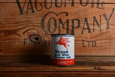 MOBIL: A one pound 'Vacuum snow white petroleum jelly' tin with pegasus