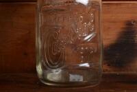 CASTROL: A 1940/50s "Castrol" embossed one imperial pint oil bottle, with 1950/60s "Castrol AA SAE 40" tin pourer and dust cover - 2