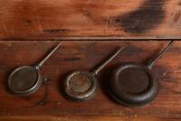 OILER: Three banjo shaped oilers, one embossed with union jack flag