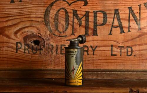 LEGGETT: An early Australia 3 1/2 ounces 'Racing Cycles' lubrication oil tin, 11cm overall
