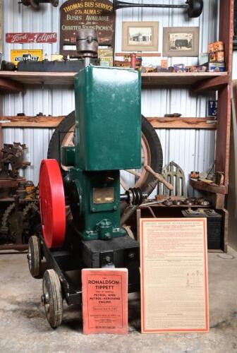 RONALDSON TIPPETT: An Austral 2 H.P tyne N petrol engine, numbered '90683', painted in green /red, sold with an original instructional booklet and wall chart, on later trolley