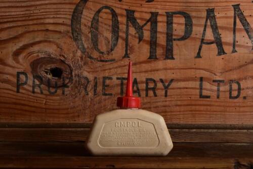 AMPOL: A 4 Oz plastic Ampol household oil bottle by Atlas Plastics