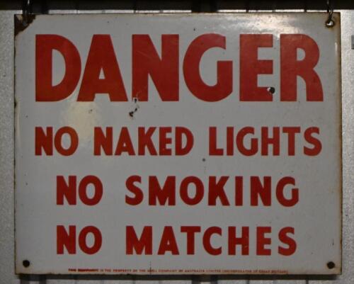 SHELL: A "Danger" tin sign, printed to the lower border: This equipment is property of the Shell company of Australia limited incorporated in Great Britain, 30 x 38cm