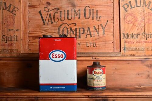 ESSO: Two Esso tins including one gallon 'Happy Motoring' oil tin and a one pint hydraulic brake fluid tin