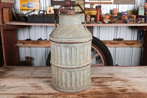 VACUUM OIL CO: A rare early 20th century galvanised steel oil can embossed "Property of The Vacuum Oil Co. Pty Ltd", approximately five gallons