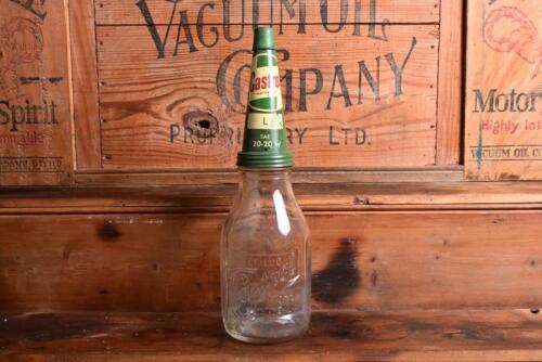 CASTROL: A 1940/50s "Castrol" embossed one imperial quart oil bottle, with 1950/60s "Castrol L SAE 20-20W" tin pourer and dust cover