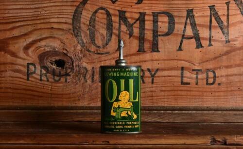 OILER: A decorative three ounce sewing machine oil can, made in USA, 13cm high