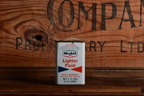 MOBIL: A 1950/60s "Mobil Lighter Fluid" four fluid ounce tin