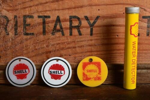 SHELL: A Shell water detector tin and three key rings, one labelled to reverse 'George & Betty Hyde, Victoria Road, Auto Port'