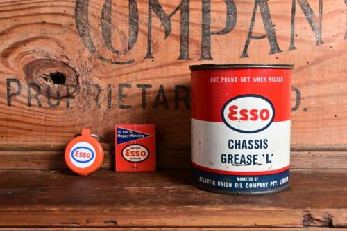 ESSO: Three Esso items including a 500 gram grease tin, sealed matches from Sunrise Service Station (Edmonton), and orange plastic key ring fob