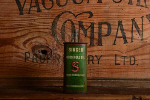 SINGER: An original Australian "Singer Household Oil" four fluid ounce tin, marked lower centre "Dom Can Co"