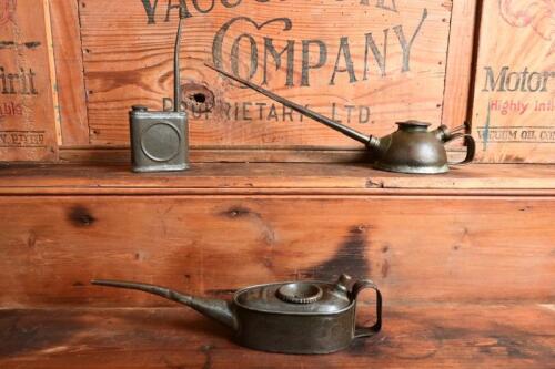 OILER: Three various oilers, made in England and USA being the largest at 38cm long