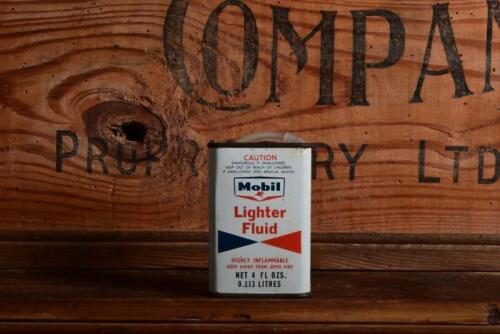 MOBIL: A 1950/60s "Mobil Lighter Fluid" four fluid ounce tin