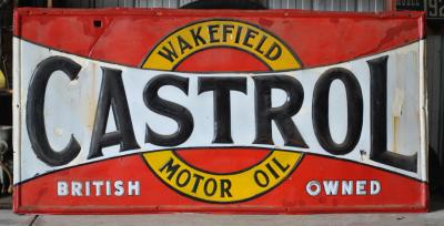 CASTROL: A large 1900/10 enamelled "Castrol Wakefield" sign, with embossed letters and border, overpainted in areas of rust, 89 x 180