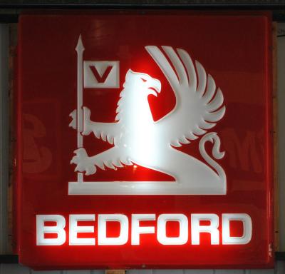 BEDFORD: A moulded acrylic illuminated "Bedford" sign, 117 x 117cm