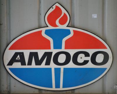 AMOCO: An original printed masonite "Amoco" sign, 40 x 50cm