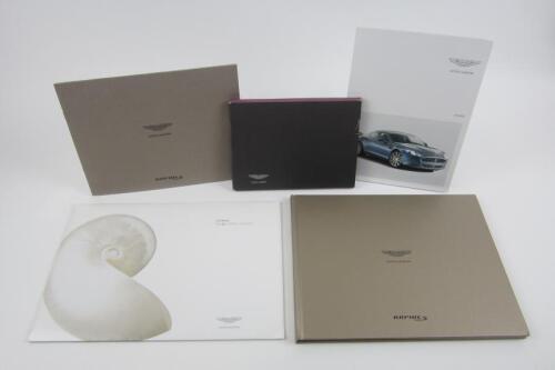 RAPIDE: A collection of Aston Martin Rapide sales brochures.
