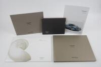RAPIDE: A collection of Aston Martin Rapide sales brochures.